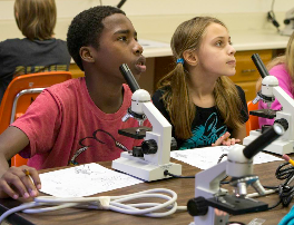 Kids with microscopes